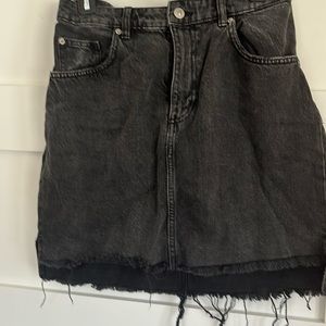 H&M size 10 high low black denim skirt with acid wash.